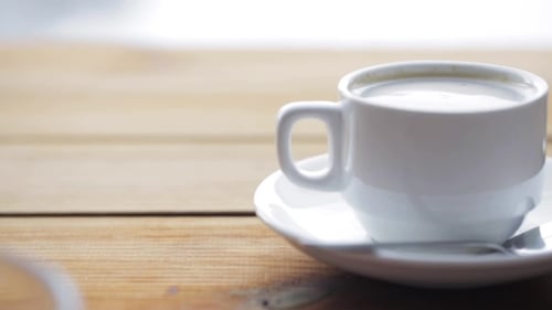 Full Cup Of Coffee On Wooden Table 47