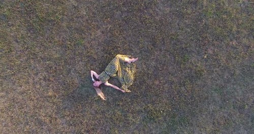 Blonde Woman Lying In Grass And Enjoying 8
