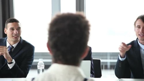 People Meeting at a Conference Table