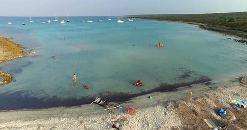 Tourists Enjoying On Beautiful Slatinica Beach At Olib Island, Croatia 4