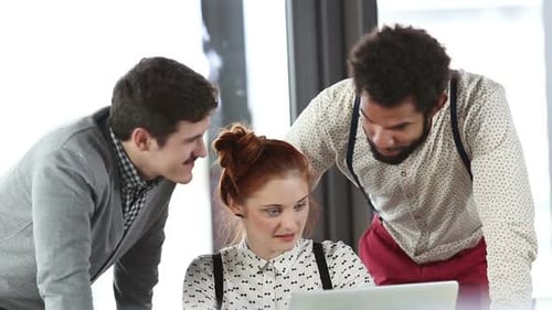 Young Creative Team Discussing Plans In Office Meeting 2