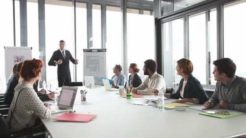 Corporate Presentation with Diverse Group in Modern Office