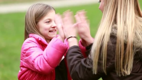 Mom And Daughter Playing Clapping Game 2