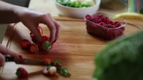 Close-Up Of Cutting Strawberries 2
