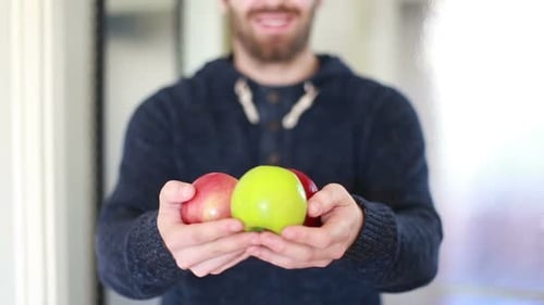View Of Man Hands Holding Apples 2
