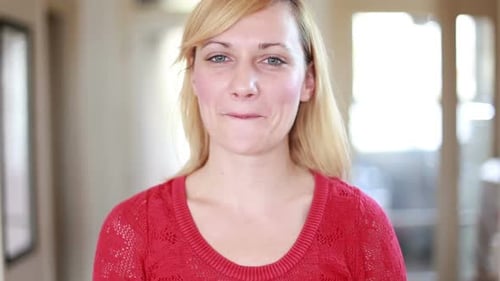 Woman Drinks Yellow Smoothie with Straw Close-Up