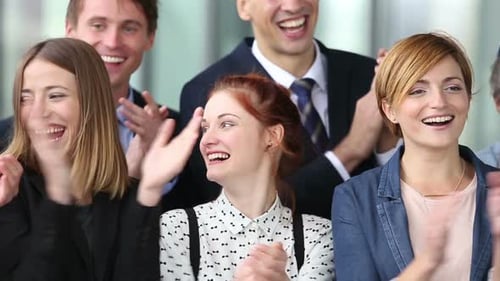 Portrait Of Happy Business People Clapping 2