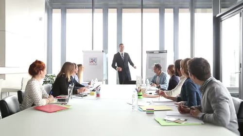 Business Presentation in Modern Office Conference Room