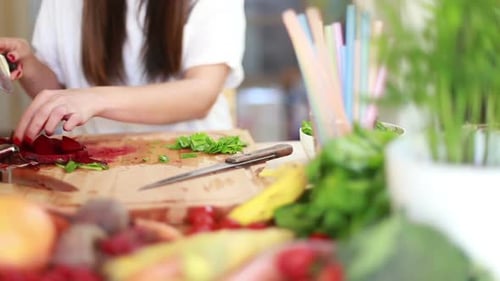 Woman Cutting Beetroot With Knife 4