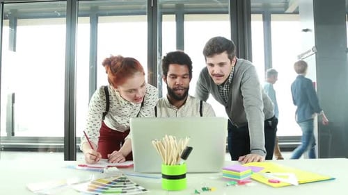 Collaborative Team Working Together at a Modern Office