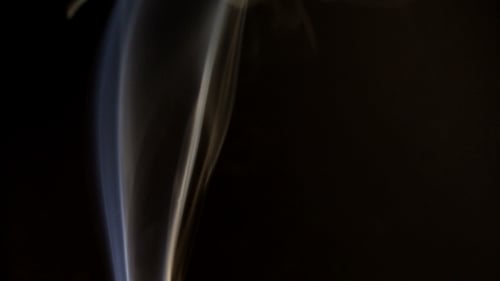 Elegant Smoke Rising Abstractly on Black Background