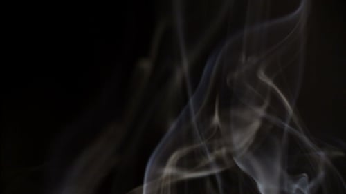 Abstract Swirling Smoke on Black Background