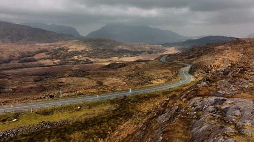 Molls Gap, Killarney, Kerry, Ireland, March 2022. Drone pushes low over the rugged landscape with vi