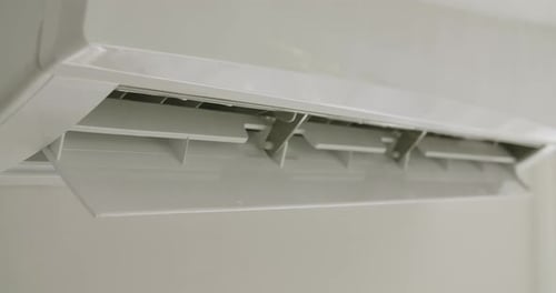 Modern Air Conditioner Vent Opens on Wall