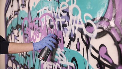 Pintura à mão Graffiti na parede