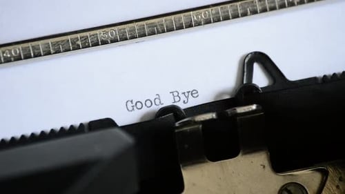 Vintage Typewriter Types Phrase 'Good Bye' Close Up