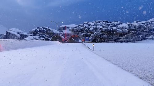 Passing Through the Tunnel in Snowy Weather