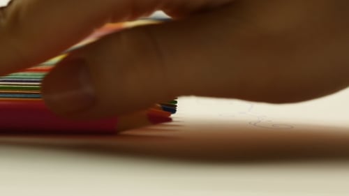 Drawing with Colorful Pencils Close Up
