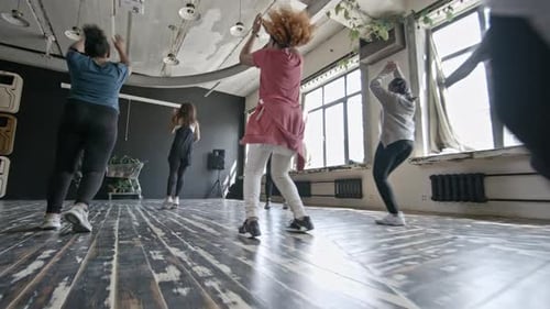 Happy Women Dancing in Studio