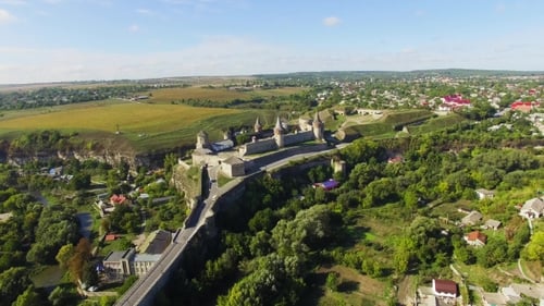 Aerial View Of Castle At Sunrise In Winter Landscape