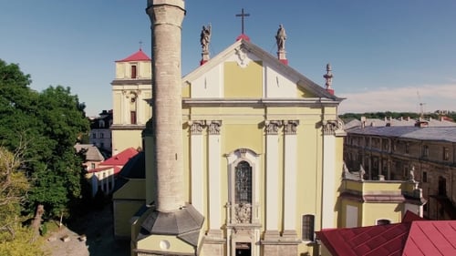 Aerial View Over Cathedral On Countryside In Mountains At Sunset