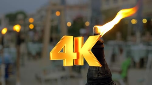 Burning Beach Torch In The Evening