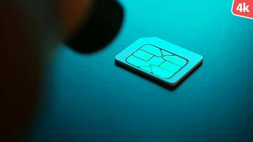 Close Up of Sim Card Scanned by Red Laser