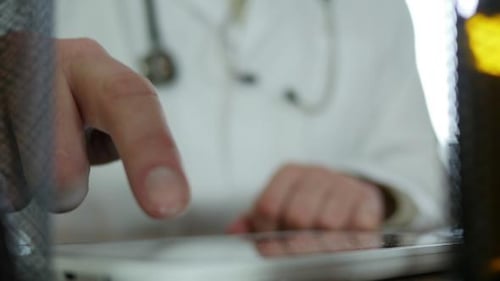 Typing On Tablet In Hospital