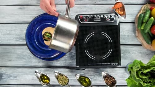 Creamy Sauce Poured Over Gourmet Dish Overhead