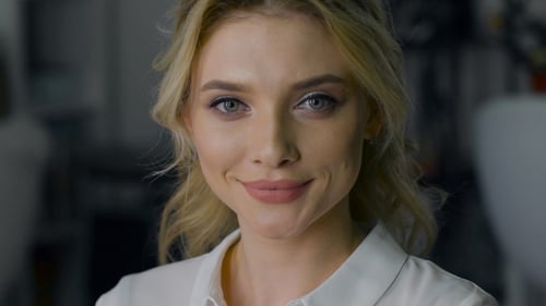 Smiling Woman with Blonde Hair in Close Up