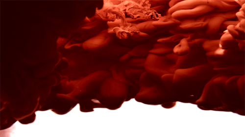 Roter Tintenstrahl im Wasser 2