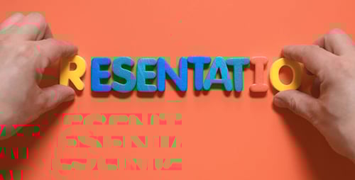 Hands Spell Out Presentation with Colorful Block Letters