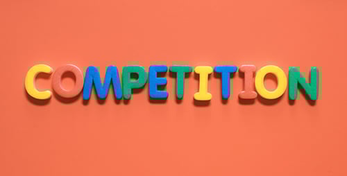 Hands Disassemble Competition Message with Colorful Letters