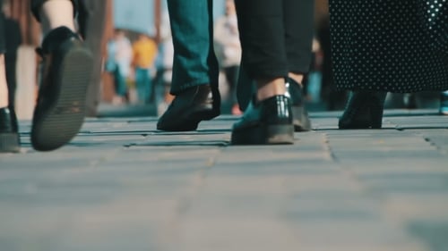 Anonymous People Walking On The Street