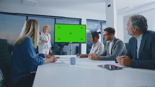 Business Team Meeting With Green Screen Presentation