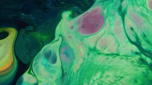 Psychedelisch streuende Farbe wirbelt und explodiert