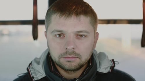 Man Looking Intently into the Camera