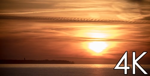 Golden Sunset Over a Calm Ocean Horizon