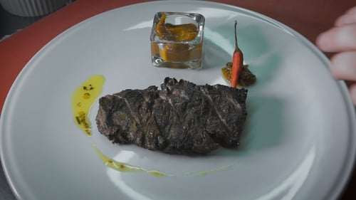 Chef Plating Appetizing Gourmet Meat Dish