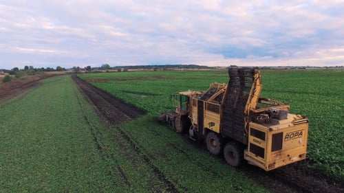 Drone Flight Aerial Bird Eye View Of Tractor Blue Sky