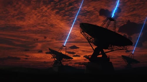 Futuristic Satellite Dishes Transmitting Data Beams at Sunset