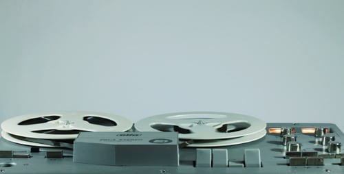 Classic Reel-to-Reel Tape Recorder in Operation