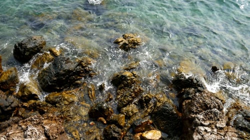 the Sea Wave and Stones