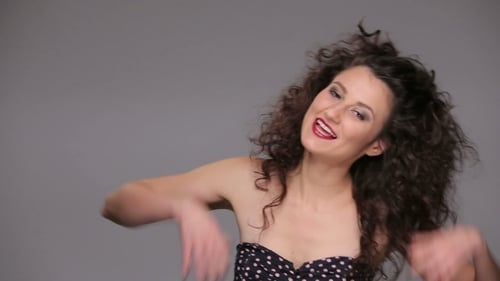 Young Brunette With Long Brown Curly Hair Dancing