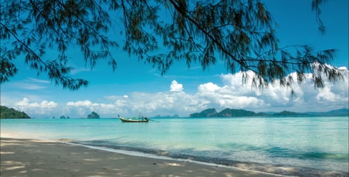 Tropical Beach Paradise with Turquoise Sea and Boat