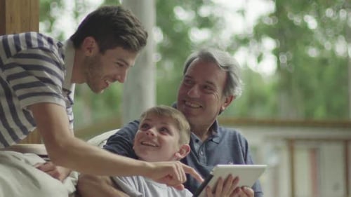 Family Time With Tablet on Porch