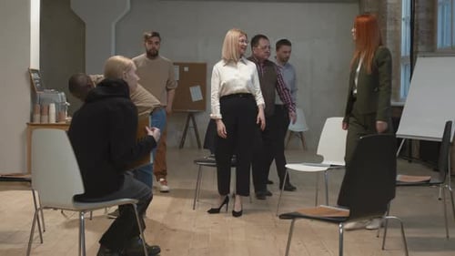 Group of People in Circle at a Meeting