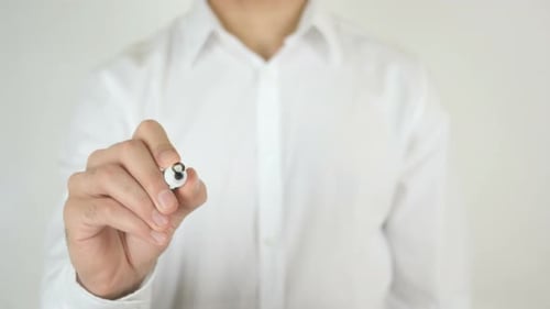 Close Up of Hand Writing 'Start Now'