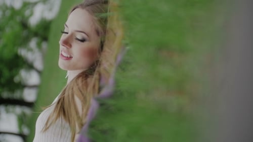 Beautiful Girl Lie On The Purple Cape And Relaxing