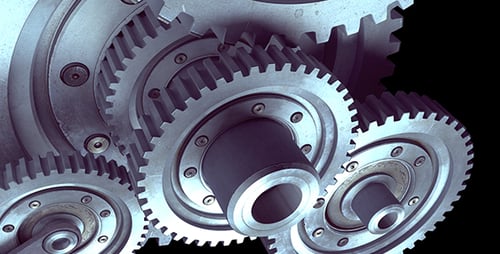 Industrial Gears Rotating Seamlessly on Black Background